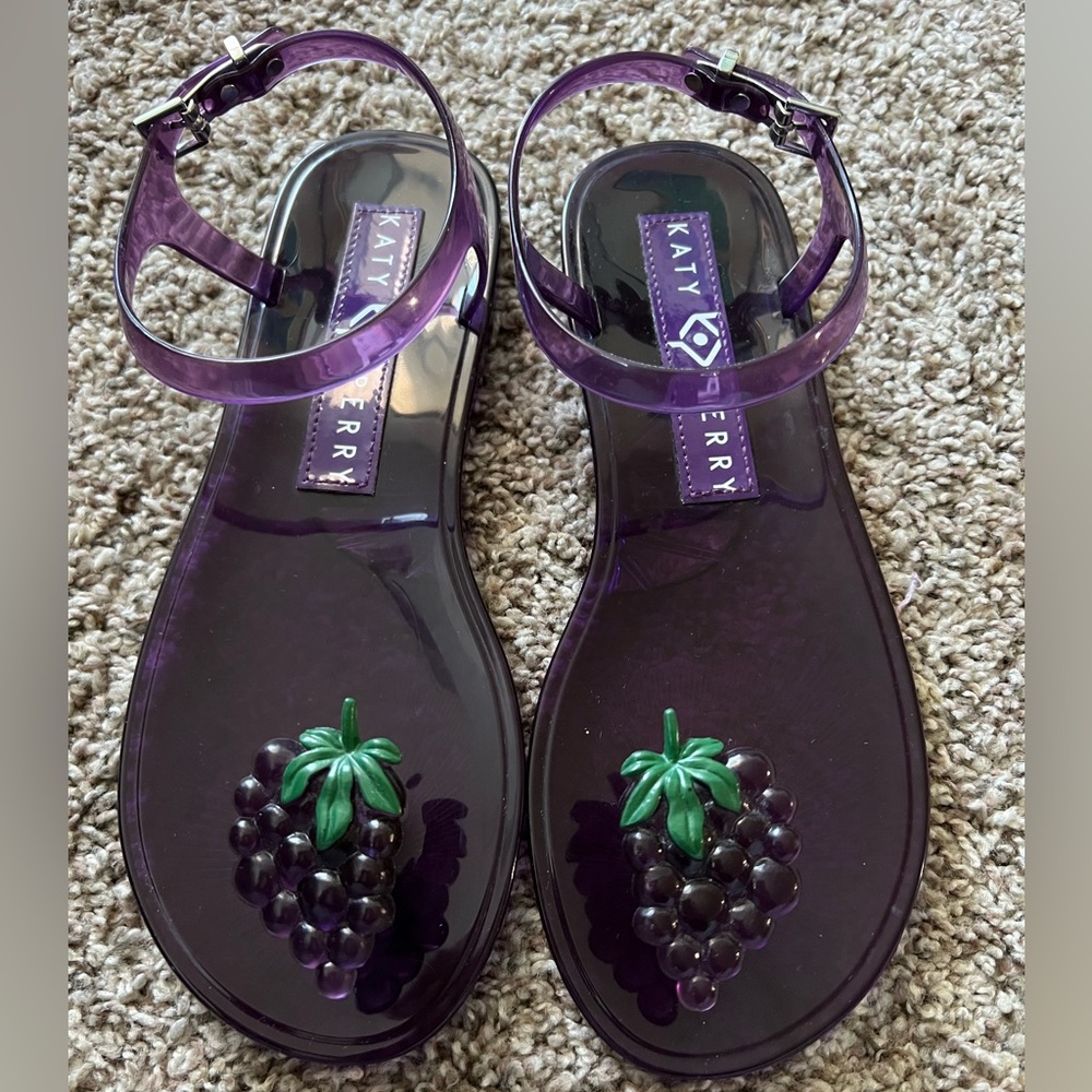 Katy Perry Jelly sandals. Purple with Grapes toe. Buckle closure. Size 7.